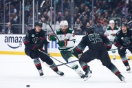 Wild survive slugfest in Seattle