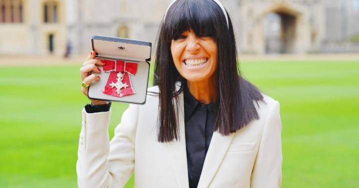 Claudia Winkleman smiles ear to ear after officially being made an MBE