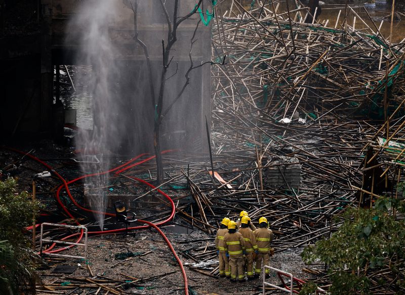 Police comb fire-ravaged Hong Kong apartments, death toll at 146