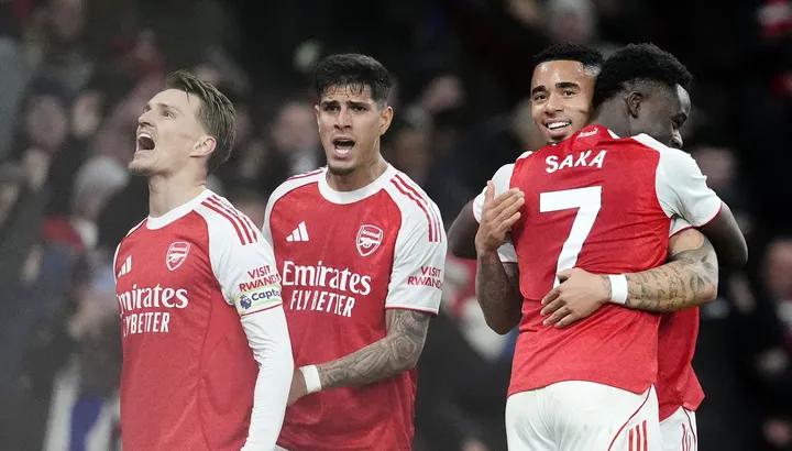 Own goals galore! Arsenal scrape past spirited Wolves after frenetic finale