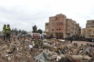 At Least 22 Killed After Multistory Buildings Collapse on Each Other