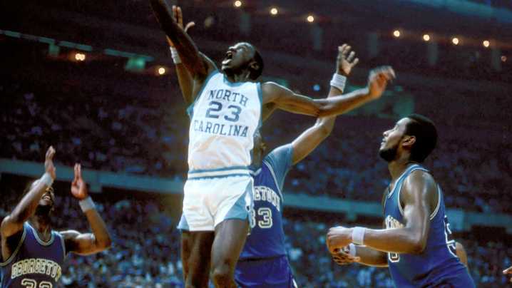 Which 15 college basketball teams have a winning record against UNC?