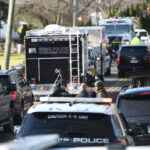 Connecticut police find decomposed body after standoff with man who shot at officers