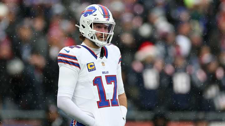 Bills' Josh Allen throws up on the sideline after Patriots touchdown