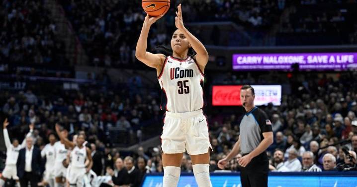 UConn's 23 steals lead top-ranked Huskies past DePaul on a day when Sue Bird's number is retired