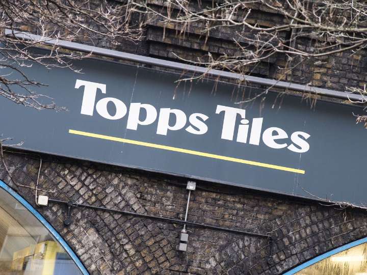 Topps Tiles buys Fired Earth brand from administration as sales growth slows