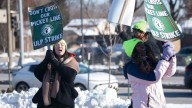 See striking Starbucks employees picket in frigid temps