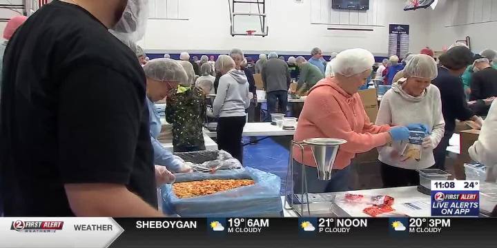 Volunteers help pack hundreds of thousands of meals for ‘Feed My Starving Children’