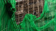 Hong Kong residents and experts defend bamboo scaffolding after deadly fire
