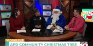 Cpl. Carmela Ogden, Blue Santa highlight community Christmas tree decorating event