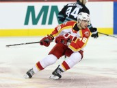Flames recall Hunter Brzustewicz as blue-line auditions continue