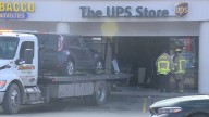 Car crashes into UPS store in northern Kentucky; witnesses rush to help