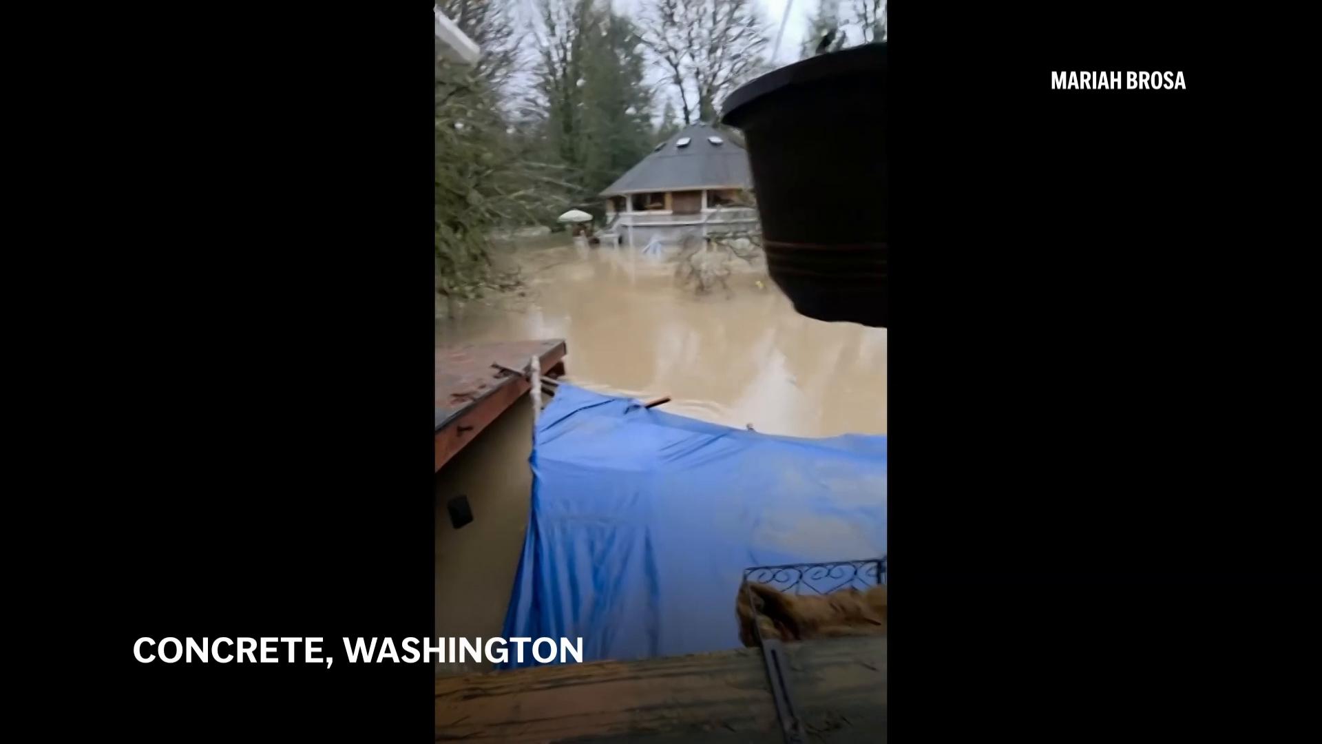 Tens of thousands ordered to flee flooding after torrential rain in Pacific Northwest