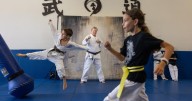 The Palisades fire was a body blow to this karate teacher. His new dojo helps kids heal