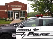 Officer helps woman yelling at passing cars: Russell blotter