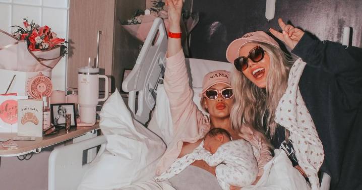 Married couple often mistaken for twin sisters welcome first child together