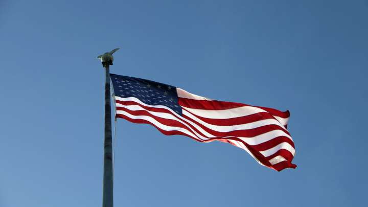 Why are flags at half-staff in Colorado?