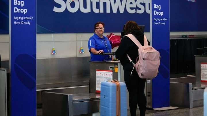 Southwest Airlines ends free checked bags, introduces new fees