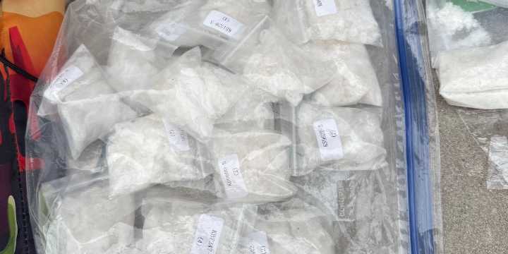 Man charged, another wanted after meth investigation starts with high