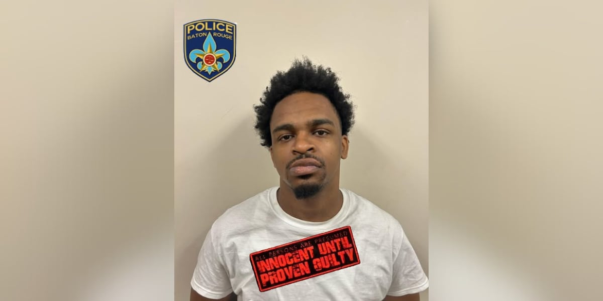 Man arrested for allegedly robbing person servicing ATM at convenience store