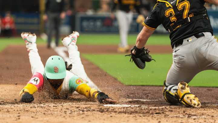 Padres slide by Pirates at sold out Petco Park