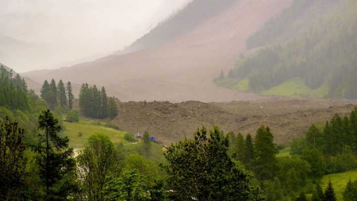 Mud and rock buries evacuated Swiss village after glacier collapse, one person missing