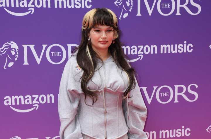 U2, Robbie Williams, Charli xcx, Lola Young & More Honored at 2025 Ivor Novello Awards: Winners List