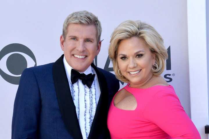 Reality stars Todd, Julie Chrisley leave prison after Trump's pardons