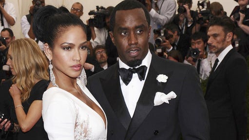 Ex-aide to Sean 'Diddy' Combs testifies that he kidnapped her to help kill Kid Cudi