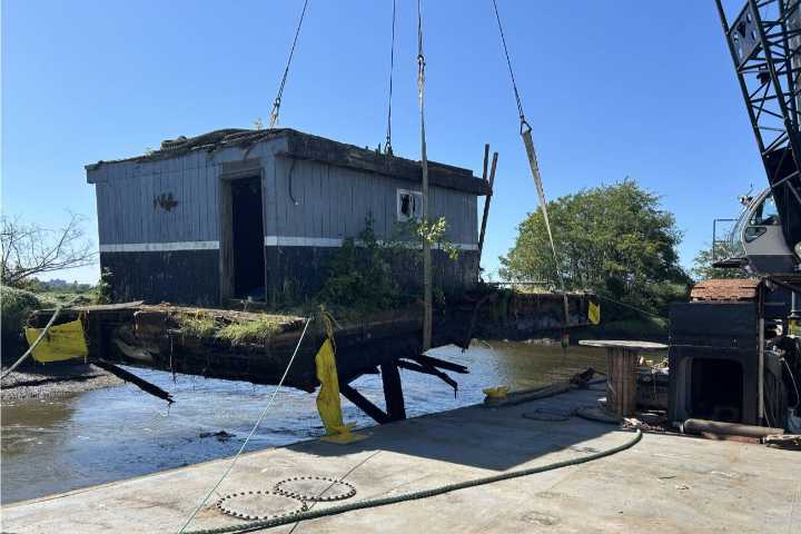 DNR removes derelict barge from Spencer Island