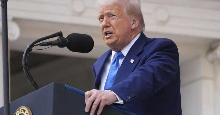 The Latest: Trump pays tribute to fallen soldiers in service at Arlington National Cemetery