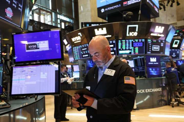 Stocks waver as Wall Street digests tariff uncertainty