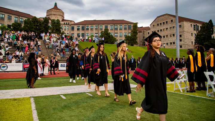 Photos: Asheville High/SILSA graduates receive their…