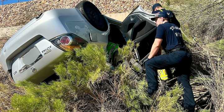 Driver rescued after crashing into wash in Tucson