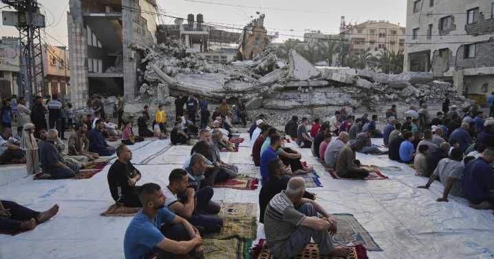 Gaza marks the start of Eid with outdoor prayers in the rubble and food growing ever scarcer