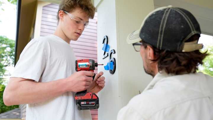See Iowa City students put the finishing touches on a new home