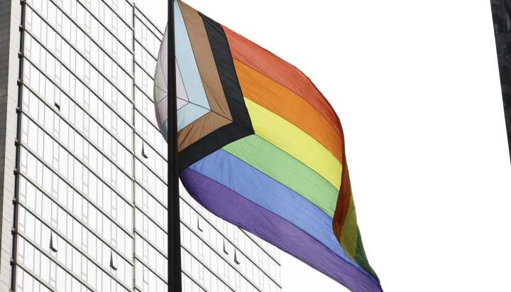 Officials raise flag for Pride month, call for stand against LGBTQ+ rights rollbacks