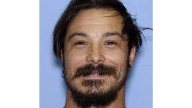 A dad accused of killing his 3 young daughters is on the run. Here's what to know