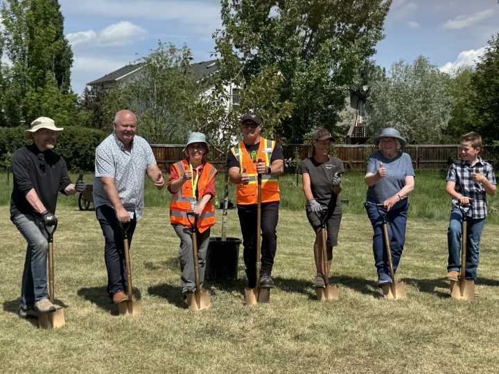 Lacombe mayor helps plant elder tree at new forest groundbreaking