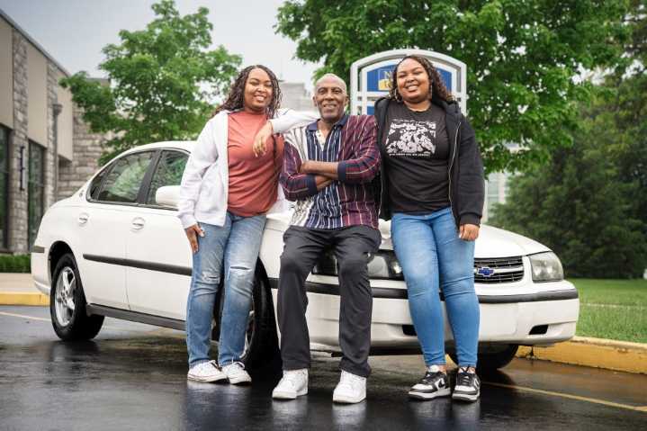 Thanks to a dedicated dad, twins graduate from Neumann University