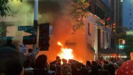 Protests flare across US as Marines prepare to deploy in LA