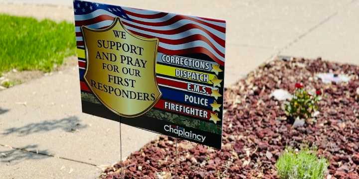 Bismarck chaplain’s yard signs deliver powerful message to first responders