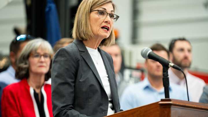 Kim Reynolds signs $1.2B unemployment tax cut for businesses into law