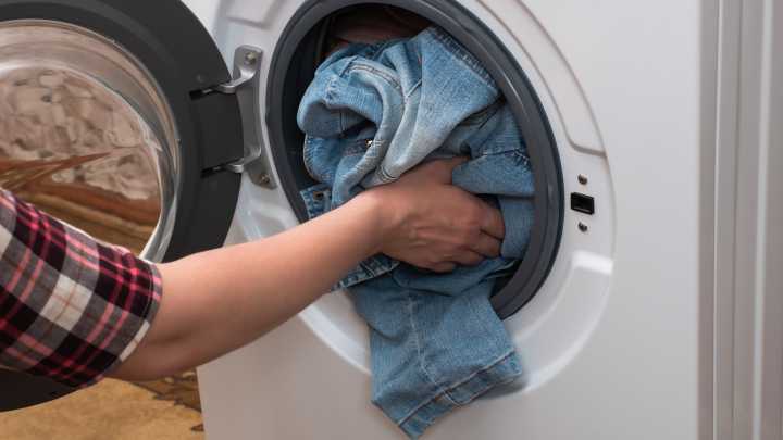 The Laundry Mistake That's Leeching The Life Out Of Your Jeans