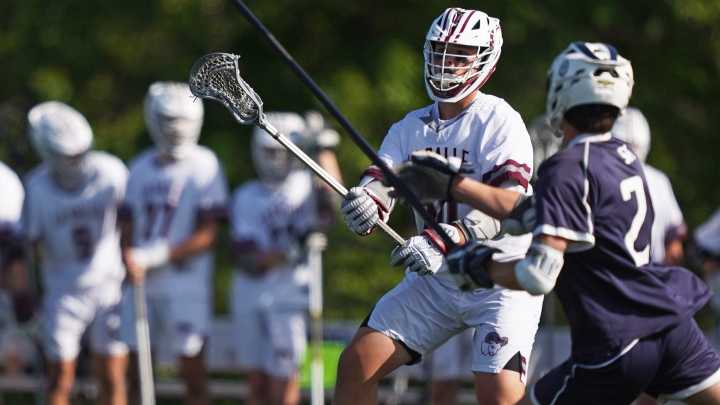 La Salle boys lacrosse celebrates winning the state championship on June 7