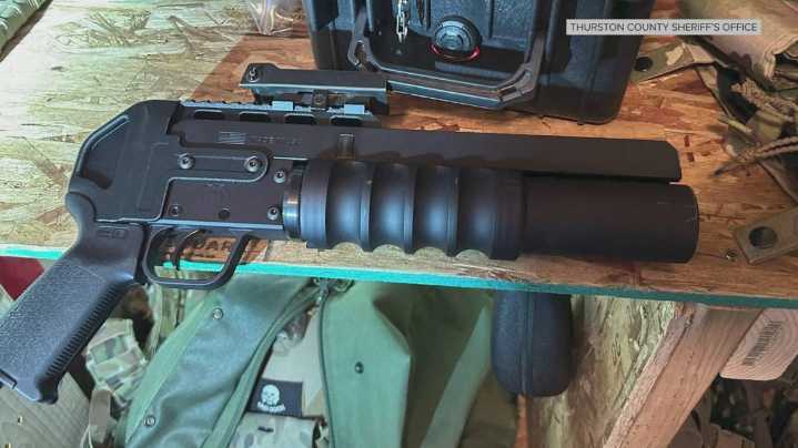 2 arrested with arsenal and Nazi paraphernalia after base robbery were ex