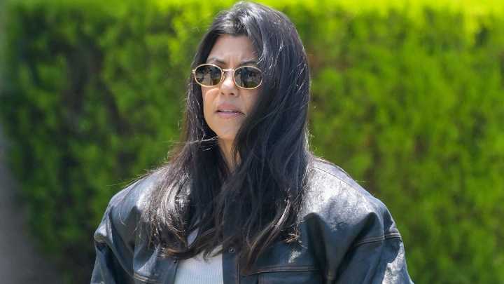 Kourtney Kardashian sparks rumors she's pregnant with 5th child after her 'bump' is spotted in candid photo