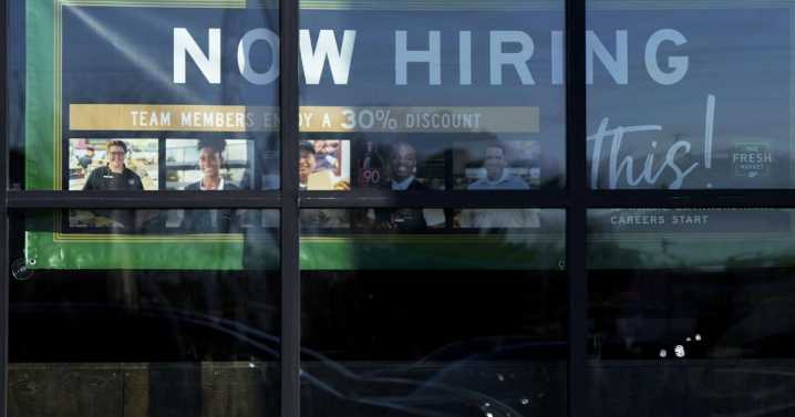 The number of Americans filing for jobless benefits last week rises to highest level in eight months