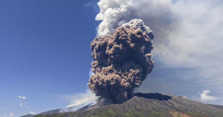 Sicily's Mount Etna erupts with columns of smoke and ash