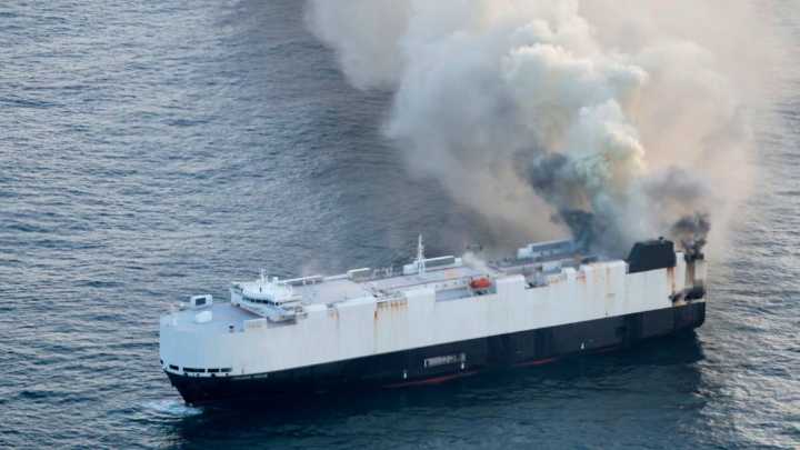 Multiple crew members rescued from lifeboat after ship catches fire